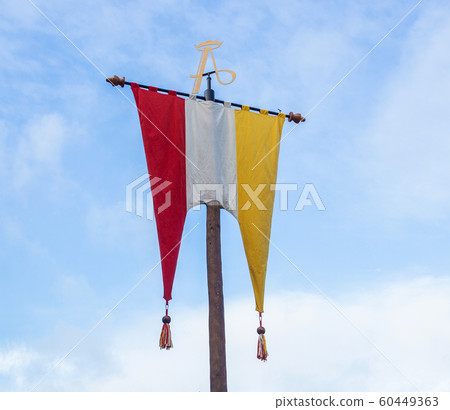 Dutch Flag of traditional festival Named Carnaval s'Hertogenbosch, Oeteldonk in the blue sky, red,white and yellow Dutch Flag of traditional festival Named Carnaval s'Hertogenbosch, Oeteldonk in the blue sky, red,white and yellow 60449363