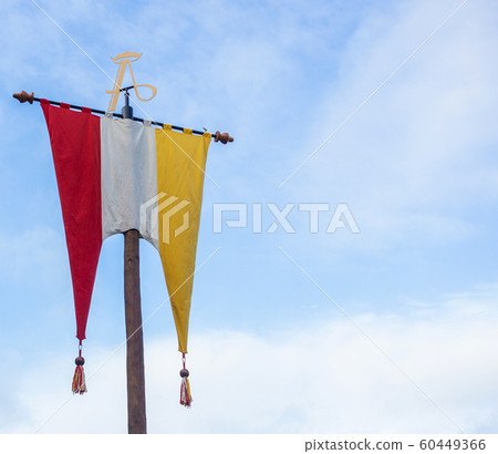 Dutch Flag of traditional festival Named Carnaval s'Hertogenbosch, Oeteldonk in the blue sky, red,white and yellow 60449366