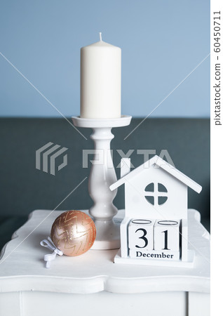 Big white candle, Christmas ball and wooden Big white candle, Christmas ball and wooden 60450711