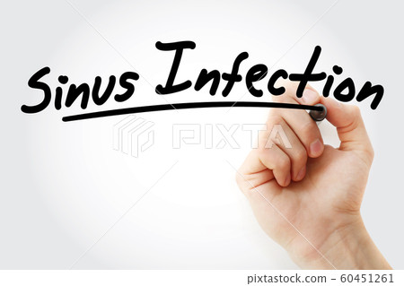 Hand writing sinus infection with marker 60451261