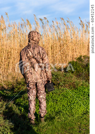 Nature photographer in action. 60452145
