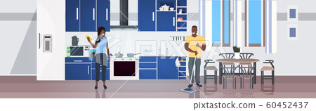 woman using rag man mopping floor family doing housework cleaning service concept modern kitchen interior horizontal full length 60452437
