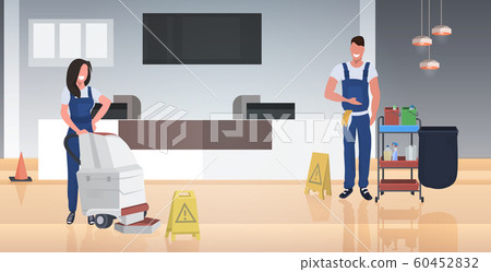 couple cleaners vacuum cleaner happy man woman janitors in uniform floor care cleaning service concept modern business center lobby interior horizontal full length 60452832