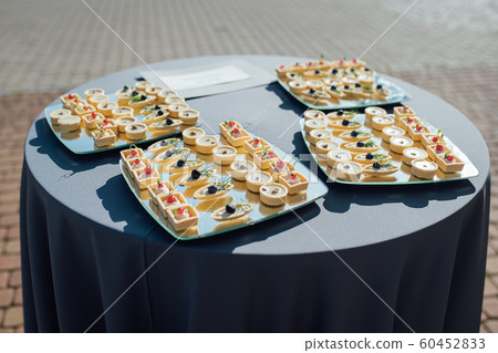 Snacks, fish and meat specialities on the buffet. Snacks, fish and meat specialities on the buffet. 60452833