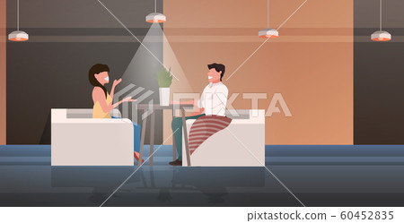 couple sitting at cafe table happy man woman discussing during meeting romantic date concept modern restaurant interior horizontal full length 60452835
