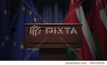 Flags of Oman and the European Union at international meeting, 3D rendering 60454939