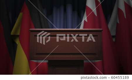 Row of flags of Bahrain and Germany and and speaker tribune, conceptual 3D rendering 60455189