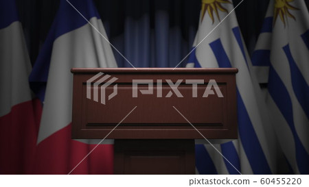 Flags of Uruguay and France and tribune, 3D rendering 60455220