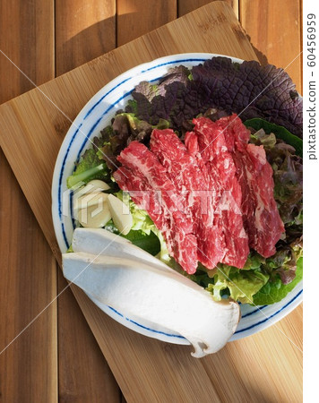 Fresh Korean beef and vegetables, garlic, lettuce, mushrooms Fresh Korean beef and vegetables, garlic, lettuce, mushrooms 60456959