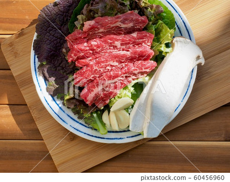 Fresh Korean beef and vegetables, garlic, lettuce, mushrooms Fresh Korean beef and vegetables, garlic, lettuce, mushrooms 60456960