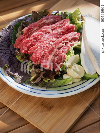 Fresh Korean beef and vegetables, garlic, lettuce, mushrooms Fresh Korean beef and vegetables, garlic, lettuce, mushrooms 60456961