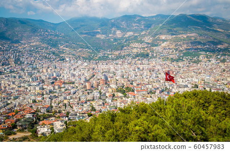 Alanya top view on the mountain with turkey flag 60457983