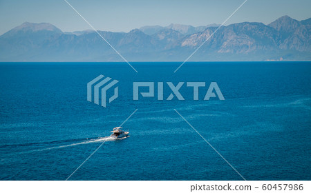 Ferry boat on blue sea and mountain background - Ferry boat on blue sea and mountain background - 60457986