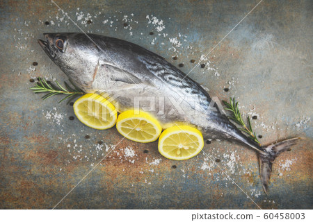 Fresh fish with herbs spices rosemary and lemon - 60458003