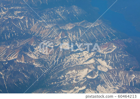 Above mountains 60464213