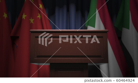 Many flags of Sudan and China behind speaker tribune, 3D rendering Many flags of Sudan and China behind speaker tribune, 3D rendering 60464924