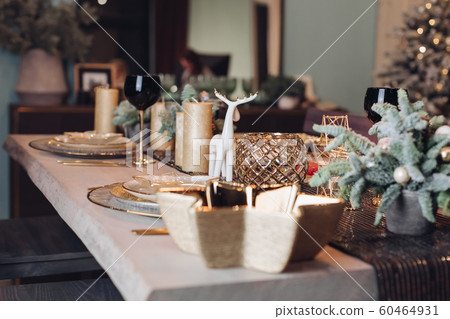 Beautiful table is setting for Christmas dinner 60464931