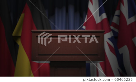 Many flags of Britain and Germany behind speaker tribune, 3D rendering 60465225