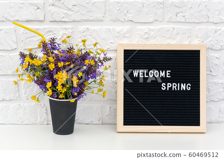 Text Hello Spring on black letter board and Text Hello Spring on black letter board and 60469512
