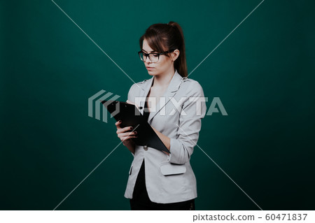 business woman Secretary stands with folder securities teacher 60471837