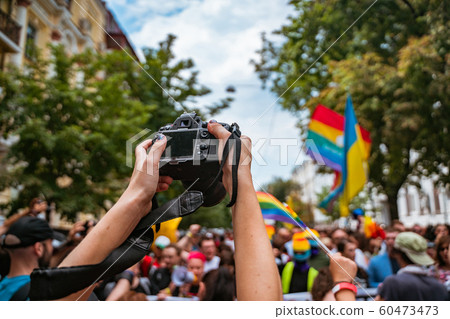 Correspondent takes photo during the Gay Pride parade 60473473