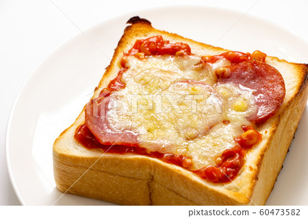 Pizza toast (white plate, white background). Easy breakfast image just by placing and baking. 60473582