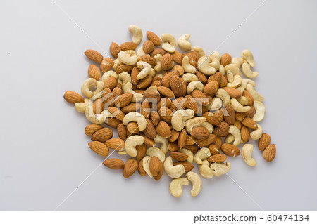 Mix of nuts Cashew and almonds on white background 60474134
