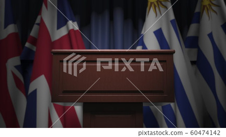 Flags of Uruguay and the United Kingdom and tribune, 3D rendering Flags of Uruguay and the United Kingdom and tribune, 3D rendering 60474142