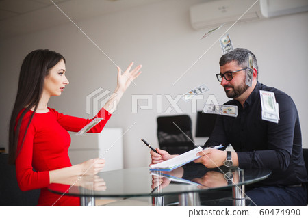 Business Woman Gives Money to Men. Woman Dressed in Red Dress Gives Bribe. Business Man In Gray Jacket Gets Bribe. High Resolution 60474990