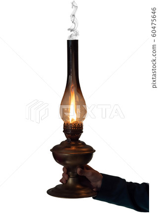 kerosene lamp in hand isolated on white kerosene lamp in hand isolated on white 60475646