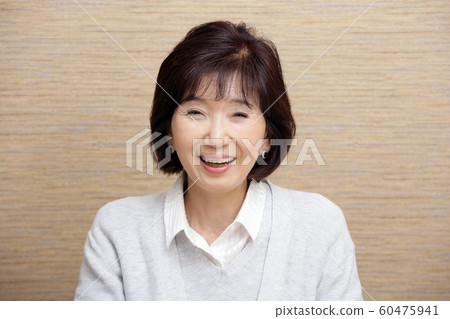 Smiling senior woman Smiling senior woman 60475941