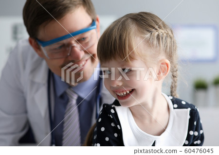 Smiling kid with doc Smiling kid with doc 60476045