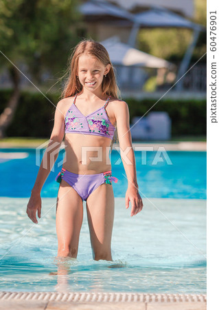 Little adorable girl in outdoor swimming pool - Stock Photo [60476901 ...