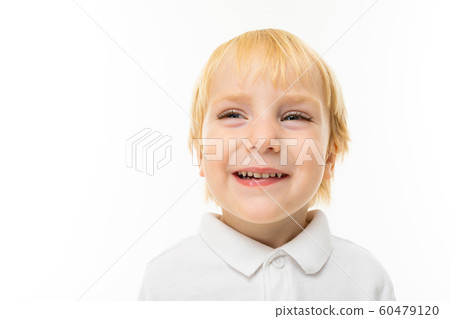 Little caucasian boy with fair red hair smiles, portrait isolated on white background Little caucasian boy with fair red hair smiles, portrait isolated on white background 60479120