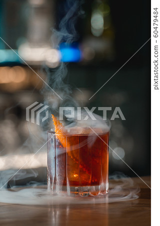Boulevardie cocktail on a bar desk. Bright background Boulevardie cocktail on a bar desk. Bright background 60479484