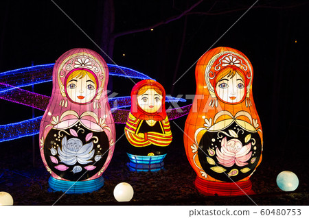 Colorful silk chinese lantern figures demonstrate traditions of Russian and Chinese culture and New Year's mood 60480753
