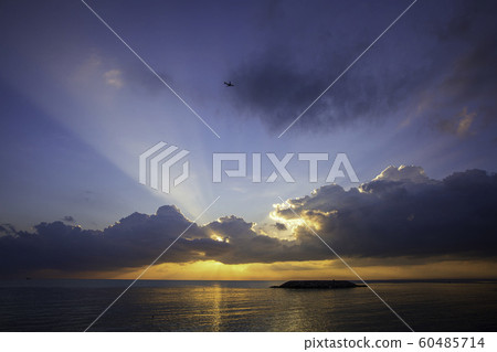 A plane was flying through the sea in the morning 60485714