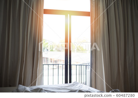 bedroom window in the morning / sunlight through 60487280