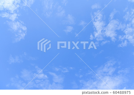 Soft blue sky background with white fluffy cloudscape nature background 60488975