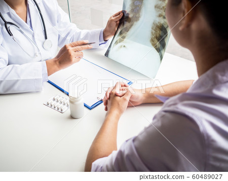 Doctors report health examination results and recommend medication to patients 60489027