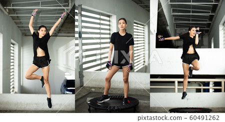 Jumping Girl model jumps on a trampoline and Pose Jumping Girl model jumps on a trampoline and Pose 60491262