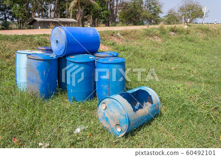 Bin many blue tanks on grass. Bin many blue tanks on grass. 60492101