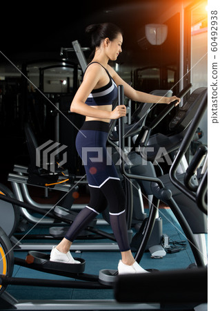 Muscular fitness woman exercises healthy lifestyle Muscular fitness woman exercises healthy lifestyle 60492938