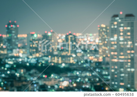 Blur city background rooftop view of cityscape business building landscape night lights bokeh Blur city background rooftop view of cityscape business building landscape night lights bokeh 60495638