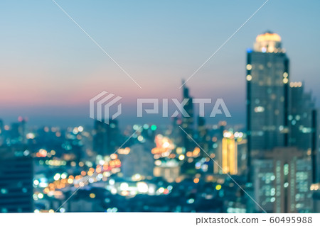 Blur city background rooftop view of cityscape business building landscape night lights bokeh Blur city background rooftop view of cityscape business building landscape night lights bokeh 60495988