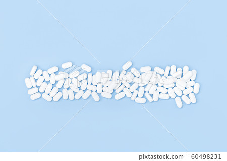 Background of white monochrome tablets on blue Background of white monochrome tablets on blue 60498231