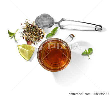 Picking of herbs, berries, tea and accessories. Top view on white background Picking of herbs, berries, tea and accessories. Top view on white background 60498455
