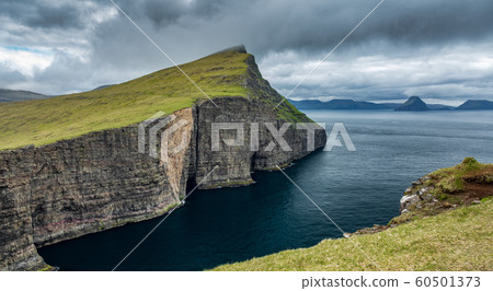Sorvagsvatn cliffs to the ocean in Faroe Islands Sorvagsvatn cliffs to the ocean in Faroe Islands 60501373