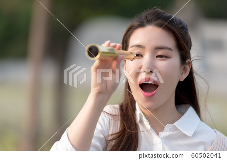 The look of a beautiful Korean woman, a park walk The look of a beautiful Korean woman, a park walk 60502041