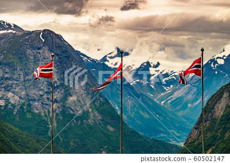 Norwegian flags and mountains landscape Norwegian flags and mountains landscape 60502147